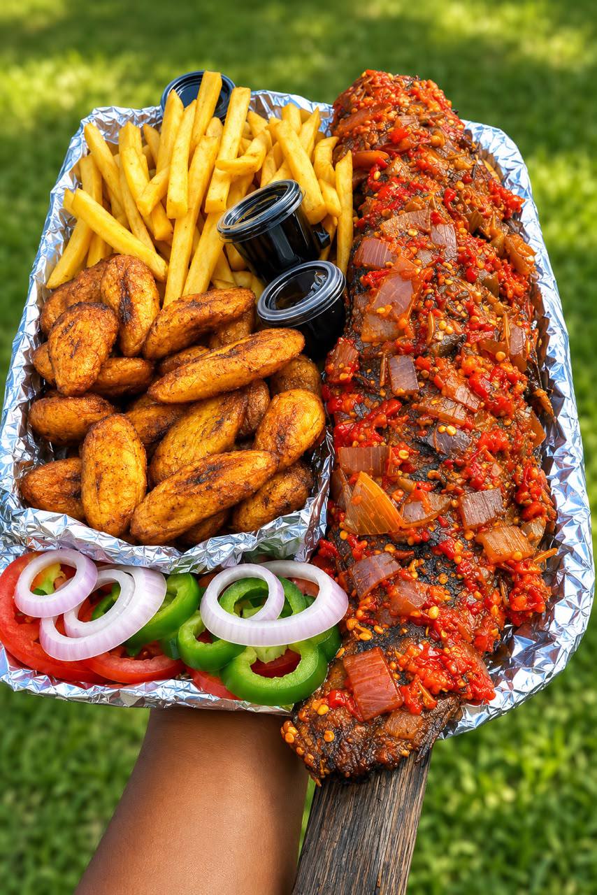 The Queen's Feast — grilled catfish with fried plantain, fries and garden salad